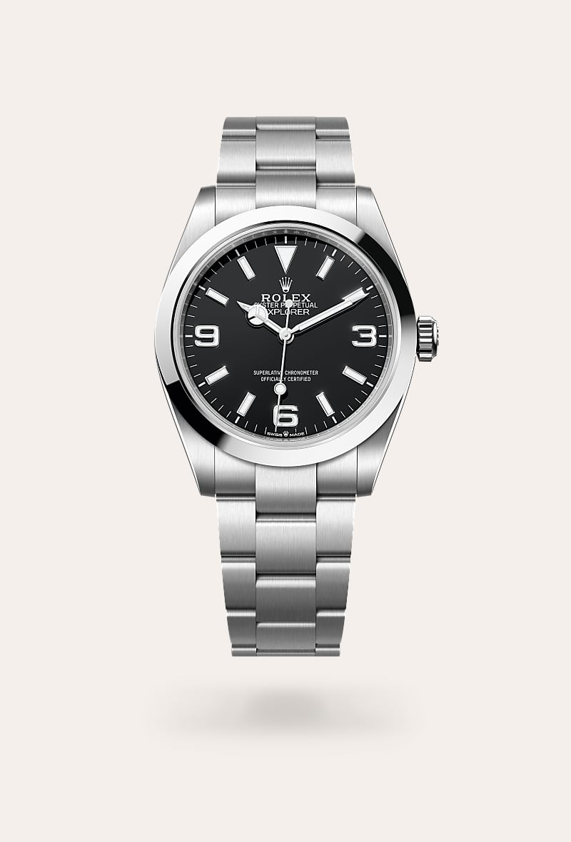 Rolex Explorer 40 in Oystersteel with a black dial, smooth bezel, and Oyster bracelet.