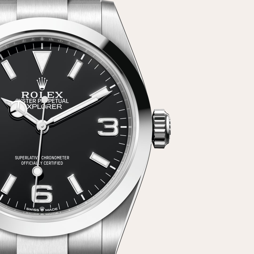 Rolex Explorer 40 in Oystersteel with a black dial, smooth bezel, and Oyster bracelet.