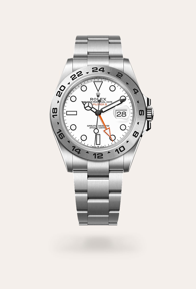 Rolex Explorer II in Oystersteel with a white dial, fixed, 24-hour graduated bezel, and Oyster bracelet.
