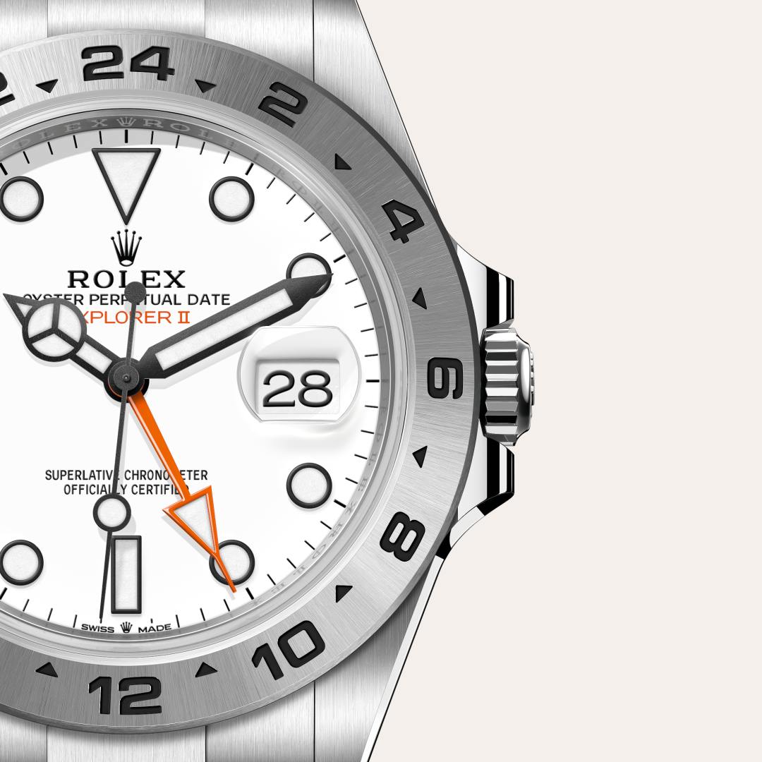 Rolex Explorer II in Oystersteel with a white dial, fixed, 24-hour graduated bezel, and Oyster bracelet.