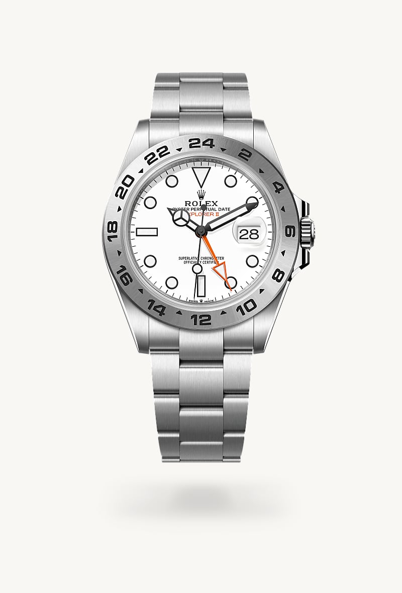 Rolex Explorer II in Oystersteel with a white dial, fixed, 24-hour graduated bezel, and Oyster bracelet.