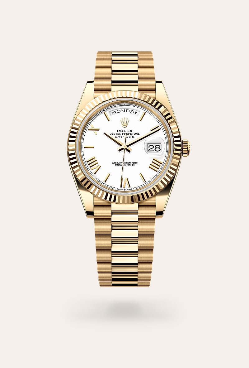 Rolex Day-Date 40 in 18 kt yellow gold with a white dial, fluted bezel, and President bracelet.