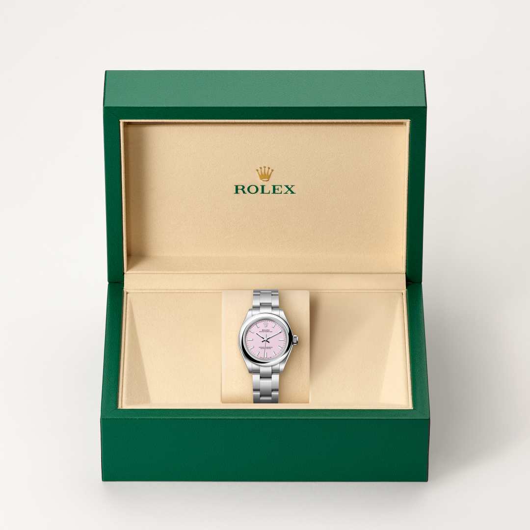 Rolex Oyster Perpetual 28 in Oystersteel with a candy pink dial, domed bezel, and Oyster bracelet.
