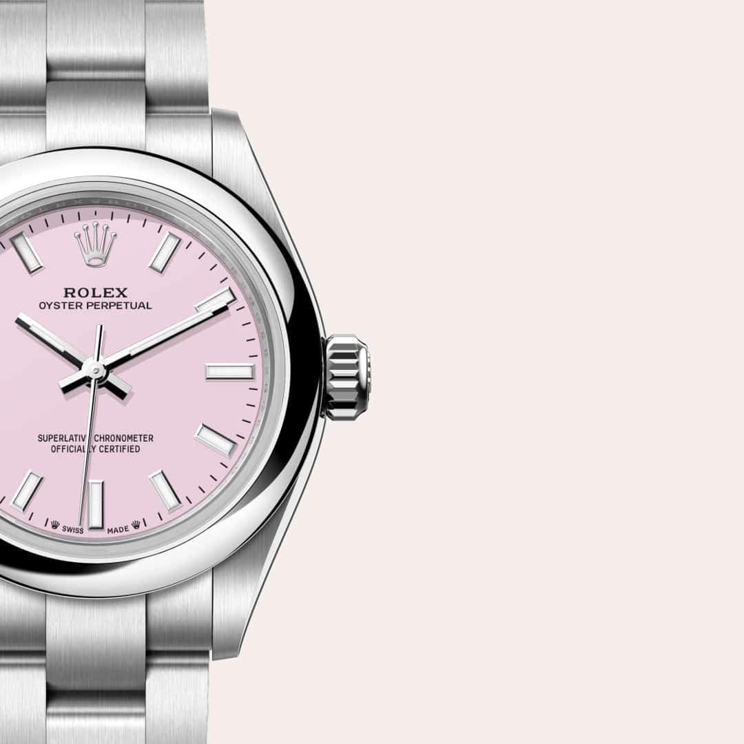 Rolex Oyster Perpetual 28 in Oystersteel with a candy pink dial, domed bezel, and Oyster bracelet.