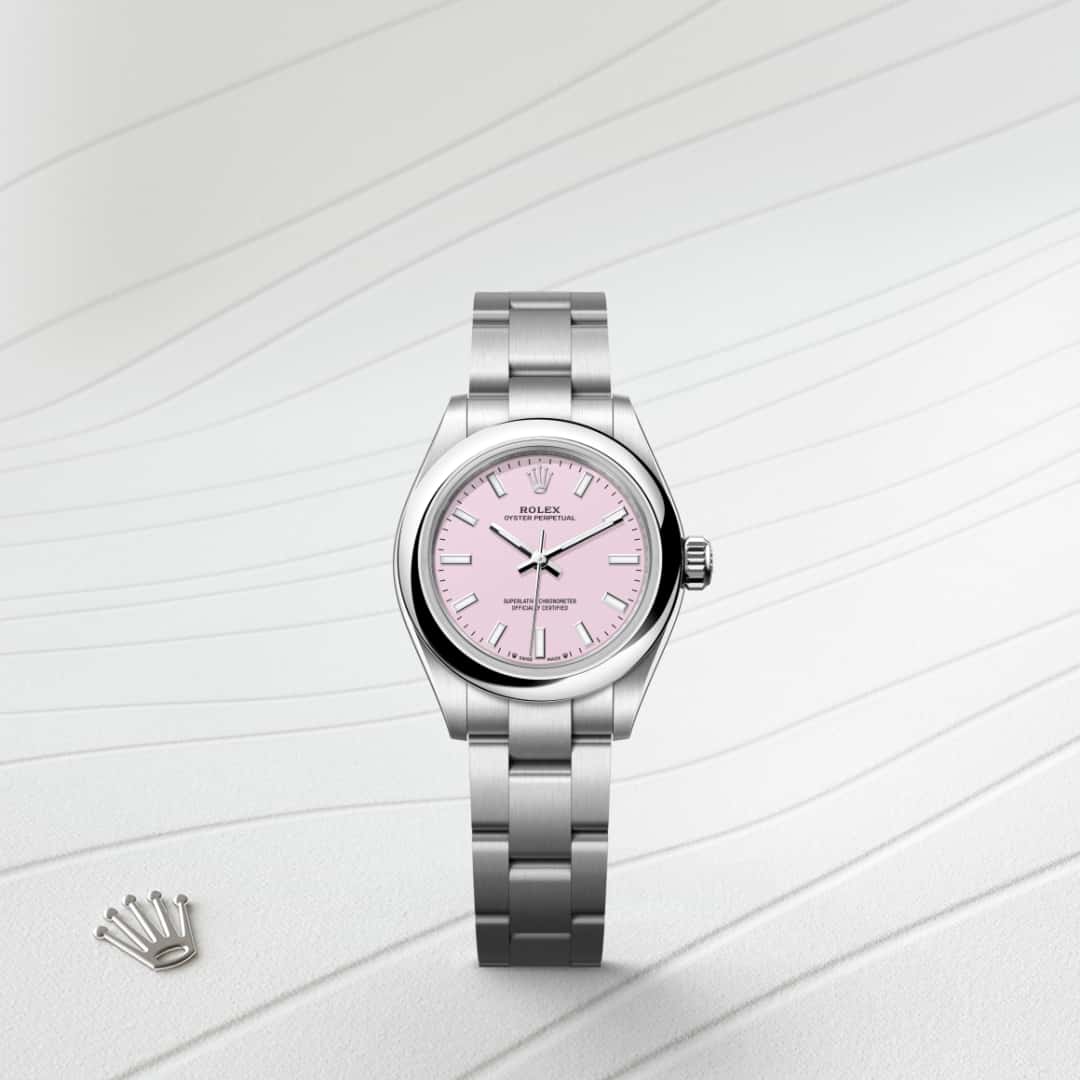 Rolex Oyster Perpetual 28 in Oystersteel with a candy pink dial, domed bezel, and Oyster bracelet.