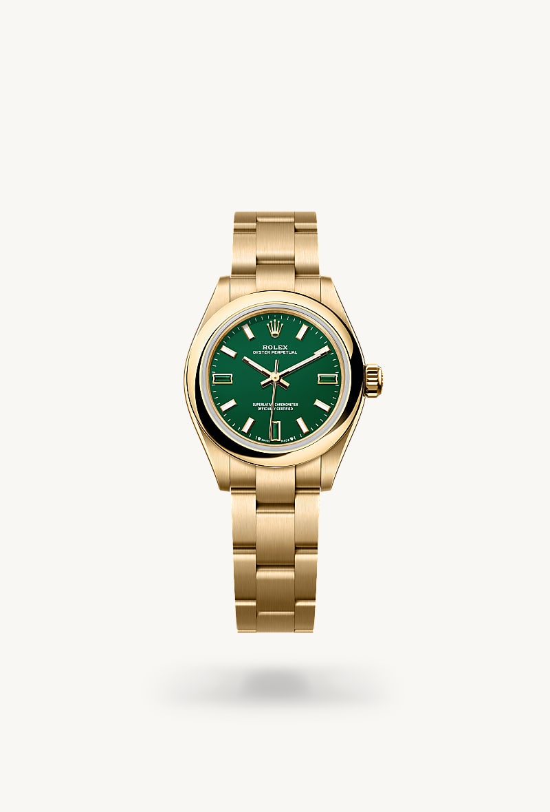 Rolex Oyster Perpetual 28 in 18 ct yellow gold with a green stone dial, domed bezel, and Oyster bracelet.