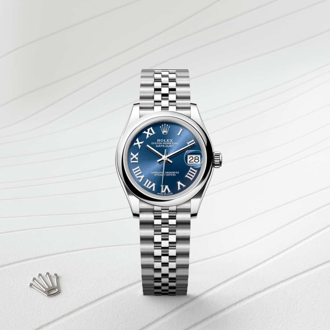 Rolex Datejust 31 in Oystersteel with a bright blue dial, domed bezel, and Jubilee bracelet.