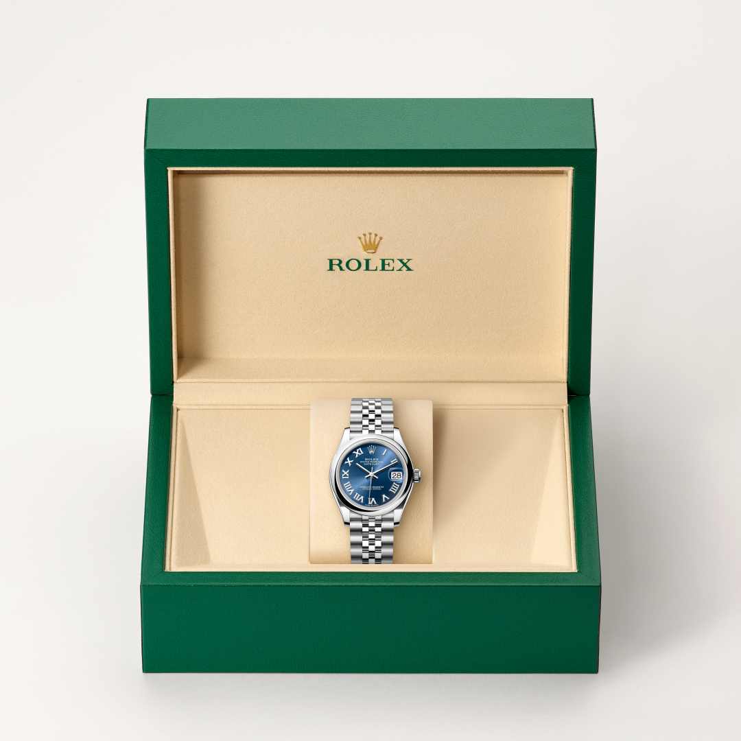 Rolex Datejust 31 in Oystersteel with a bright blue dial, domed bezel, and Jubilee bracelet.