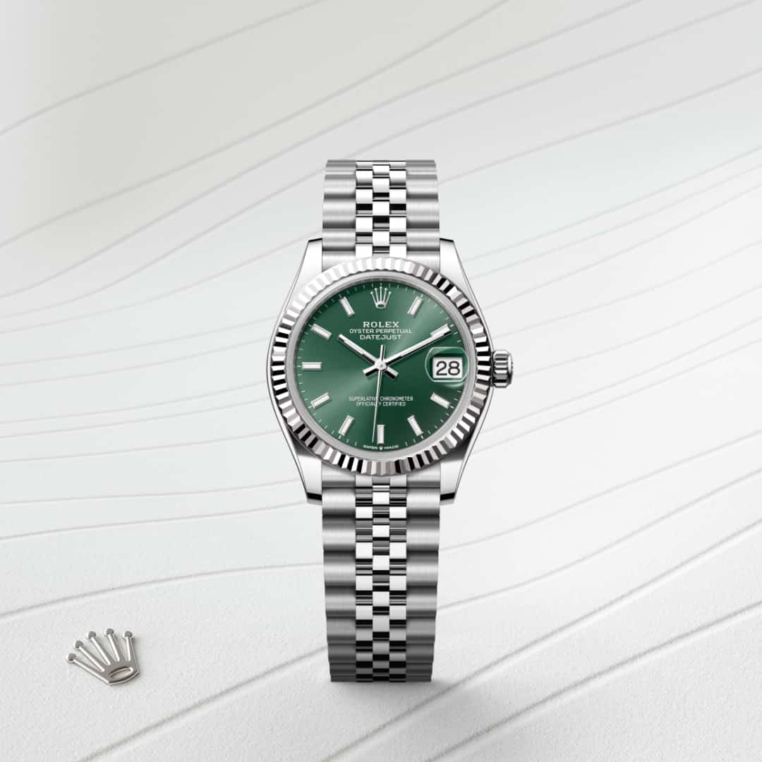 Rolex Datejust 31 in White Rolesor with a mint green dial, fluted bezel, and Jubilee bracelet.