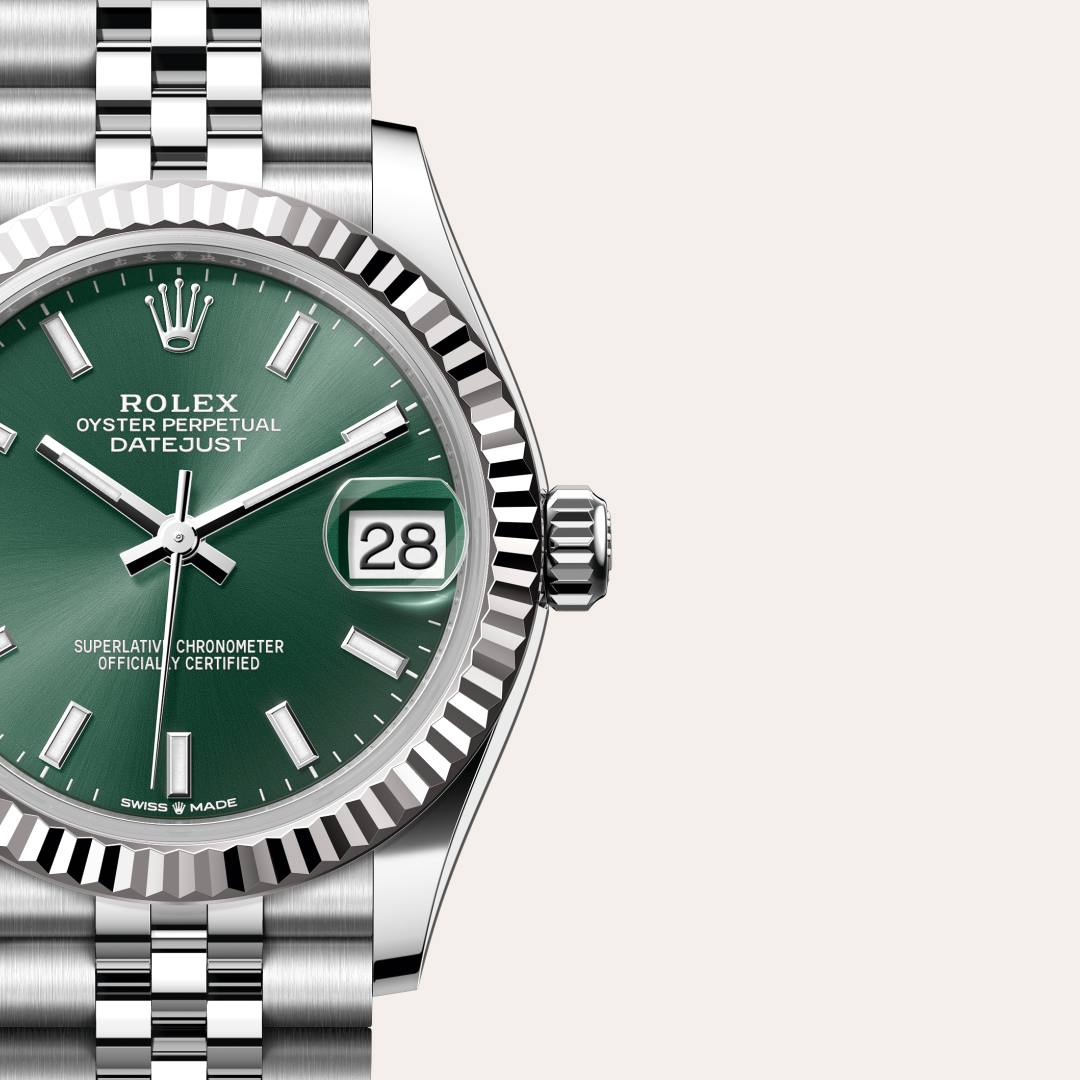 Rolex Datejust 31 in White Rolesor with a mint green dial, fluted bezel, and Jubilee bracelet.