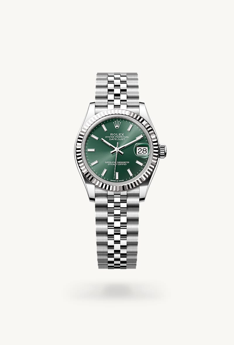 Rolex Datejust 31 in White Rolesor with a mint green dial, fluted bezel, and Jubilee bracelet.