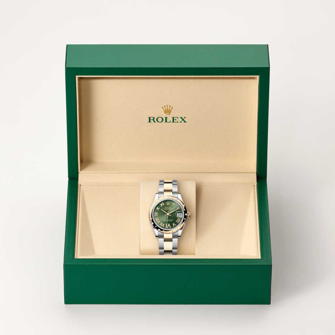 Rolex Datejust 31 in Yellow Rolesor with a olive green set with diamonds dial, domed, set with diamonds bezel, and Oyster bracelet.