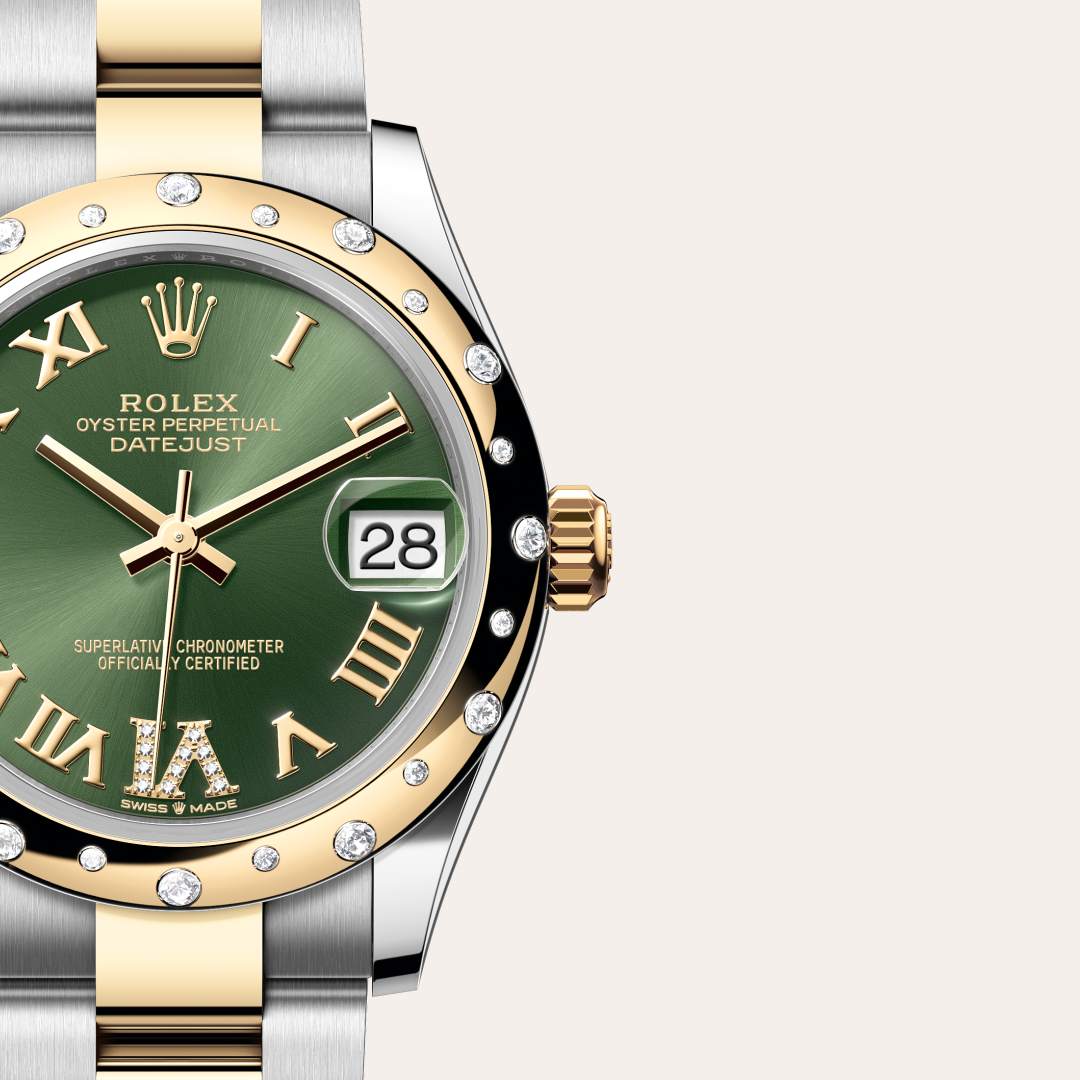 Rolex Datejust 31 in Yellow Rolesor with a olive green set with diamonds dial, domed, set with diamonds bezel, and Oyster bracelet.