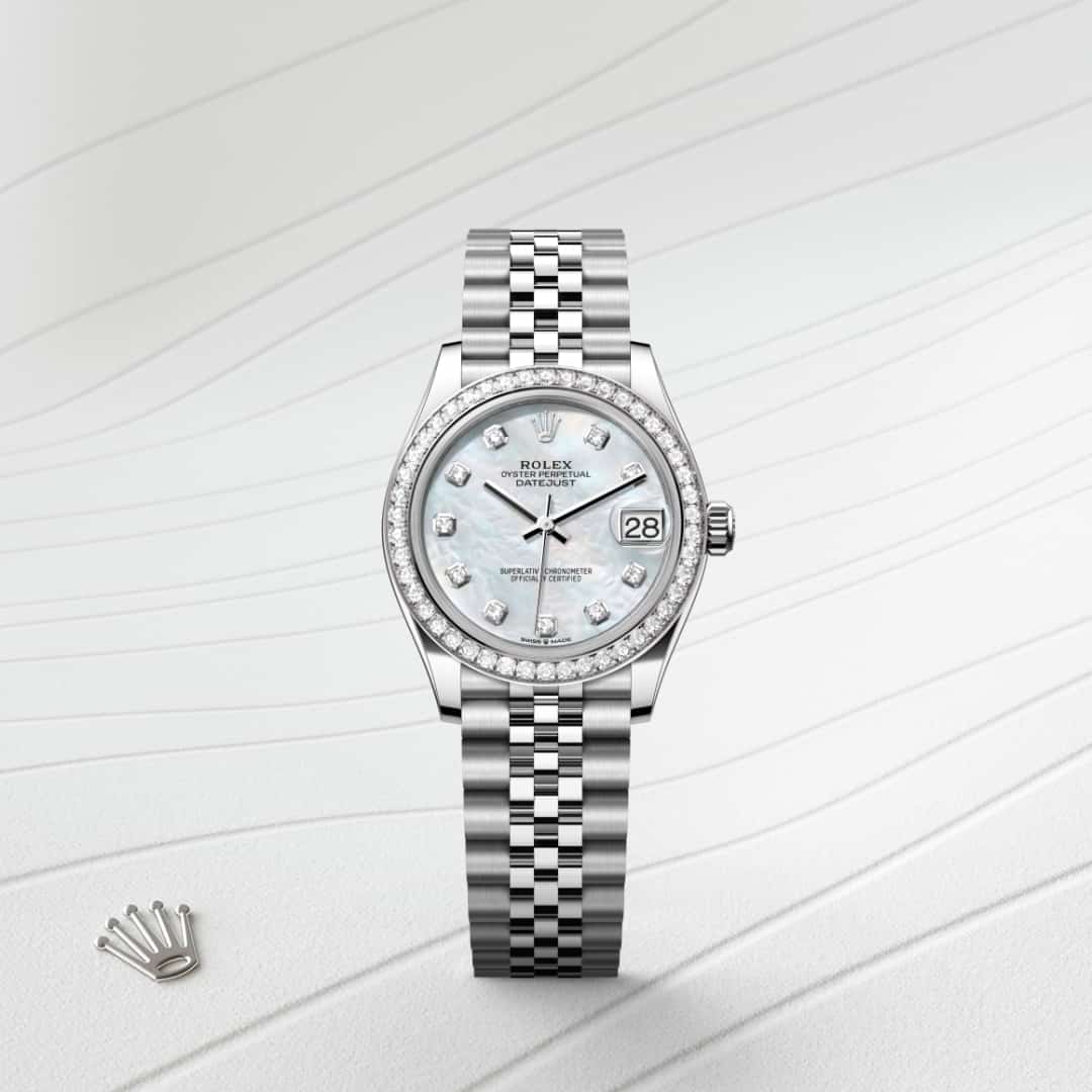 Rolex Datejust 31 in White Rolesor with a white mother-of-pearl set with diamonds dial, set with diamonds bezel, and Jubilee bracelet.