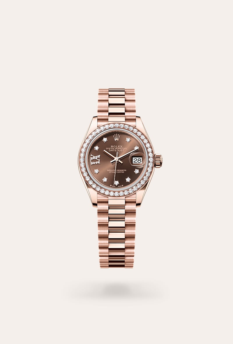 Rolex Lady-Datejust in 18 kt Everose gold with a chocolate set with diamonds dial, set with diamonds bezel, and President bracelet.