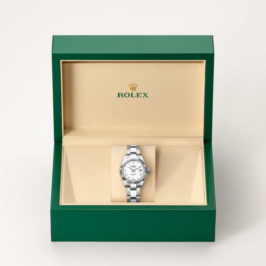Rolex Lady-Datejust in White Rolesor with a white dial, fluted bezel, and Oyster bracelet.