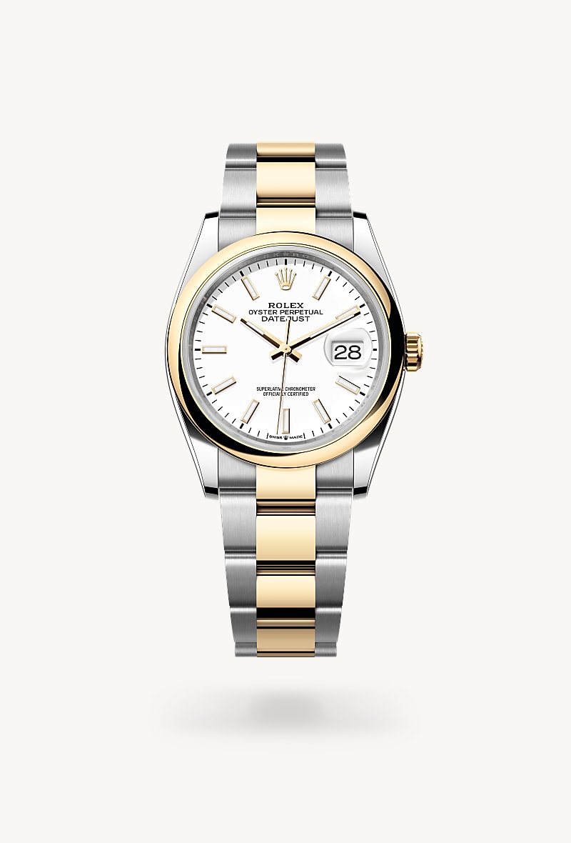 Rolex Datejust 36 in Yellow Rolesor with a white dial, domed bezel, and Oyster bracelet.