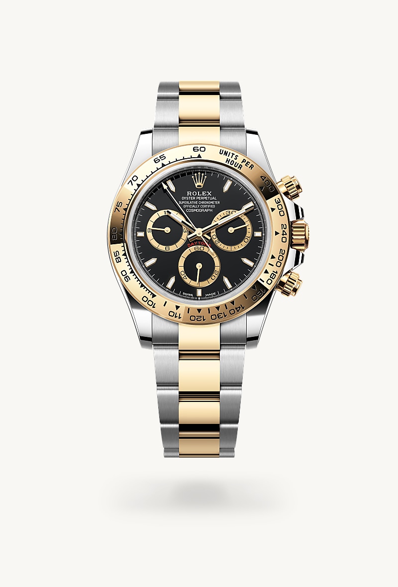Rolex Cosmograph Daytona in Yellow Rolesor with a black, golden counter rings dial, fixed, with engraved tachymetric scale, in yellow gold bezel, and Oyster bracelet.
