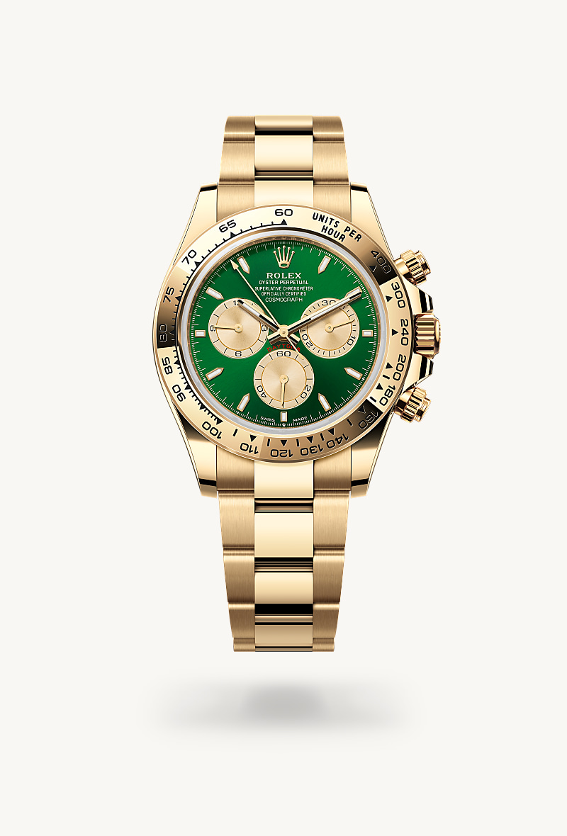 Rolex Cosmograph Daytona in 18 kt yellow gold with a bright green and golden dial, fixed, with engraved tachymetric scale, in 18 kt yellow gold bezel, and Oyster bracelet.