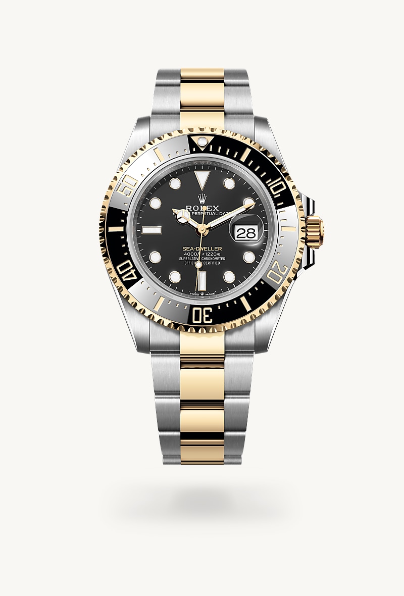 Rolex Sea-Dweller in Yellow Rolesor with a intense black dial, unidirectional rotatable 60-minute graduated, scratch-resistant cerachrom insert in black ceramic, numerals and graduations coated in gold bezel, and Oyster bracelet.
