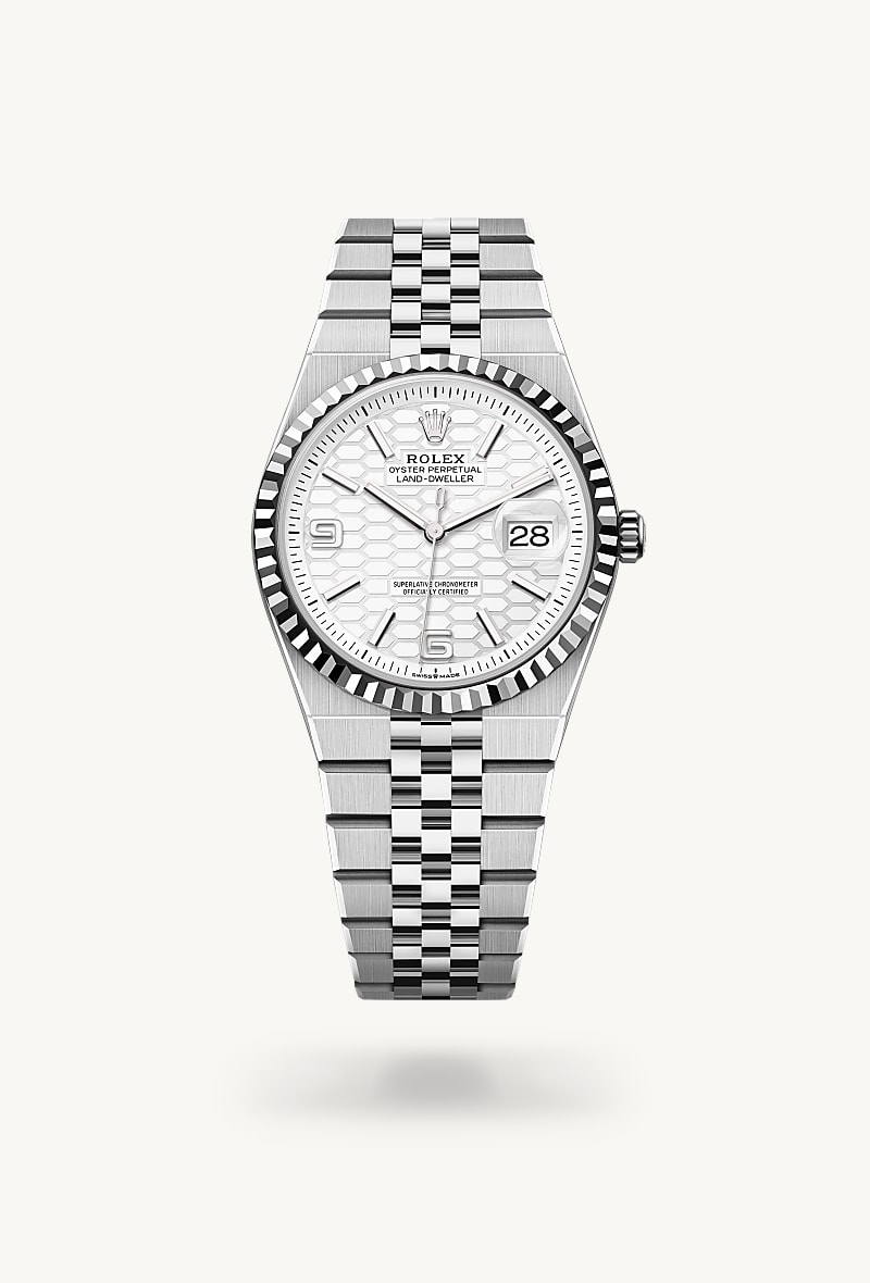 Rolex Land-Dweller 36 in White Rolesor with a intense white, honeycomb motif dial, fluted bezel, and Flat Jubilee bracelet.