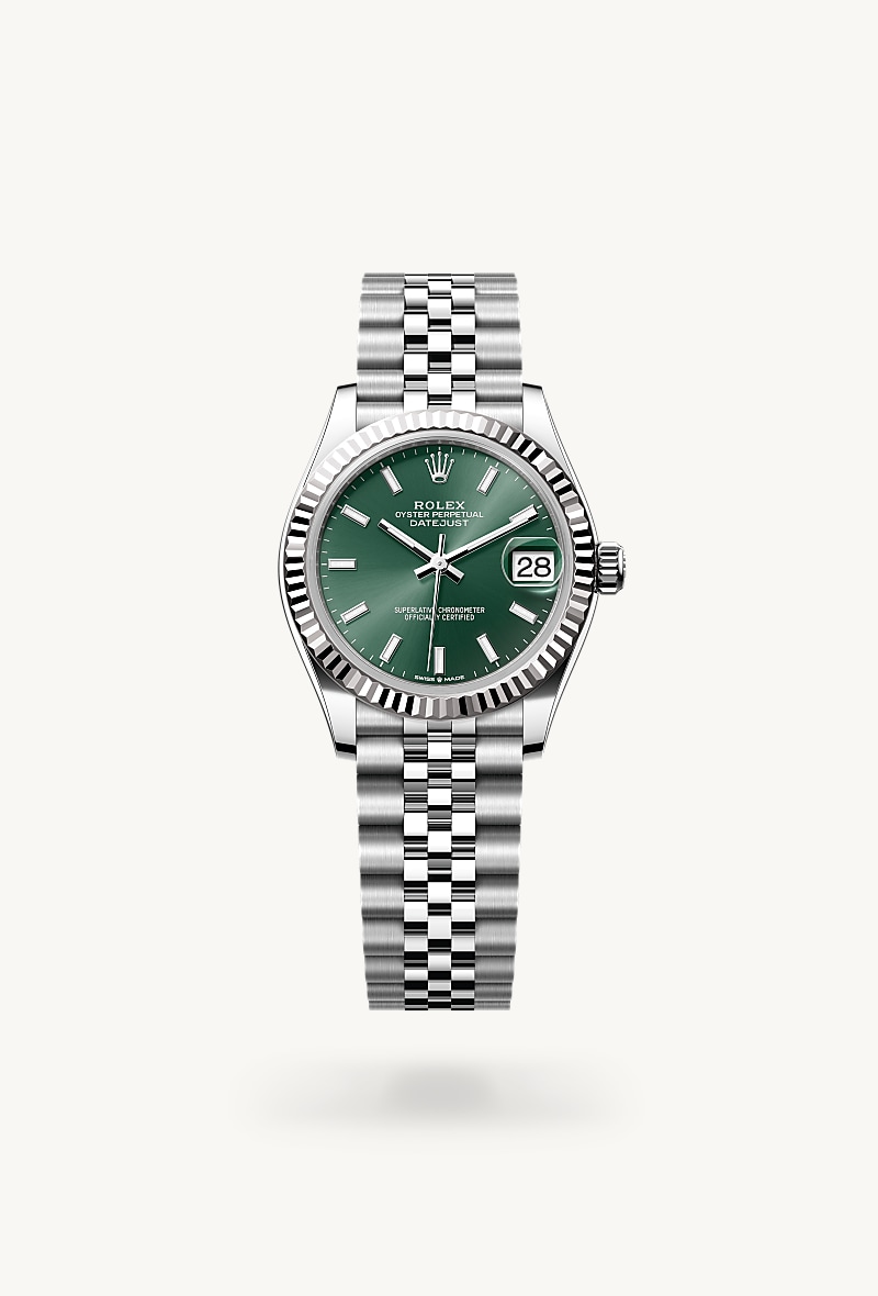 Rolex Datejust 31 in White Rolesor with a mint green dial, fluted bezel, and Jubilee bracelet.