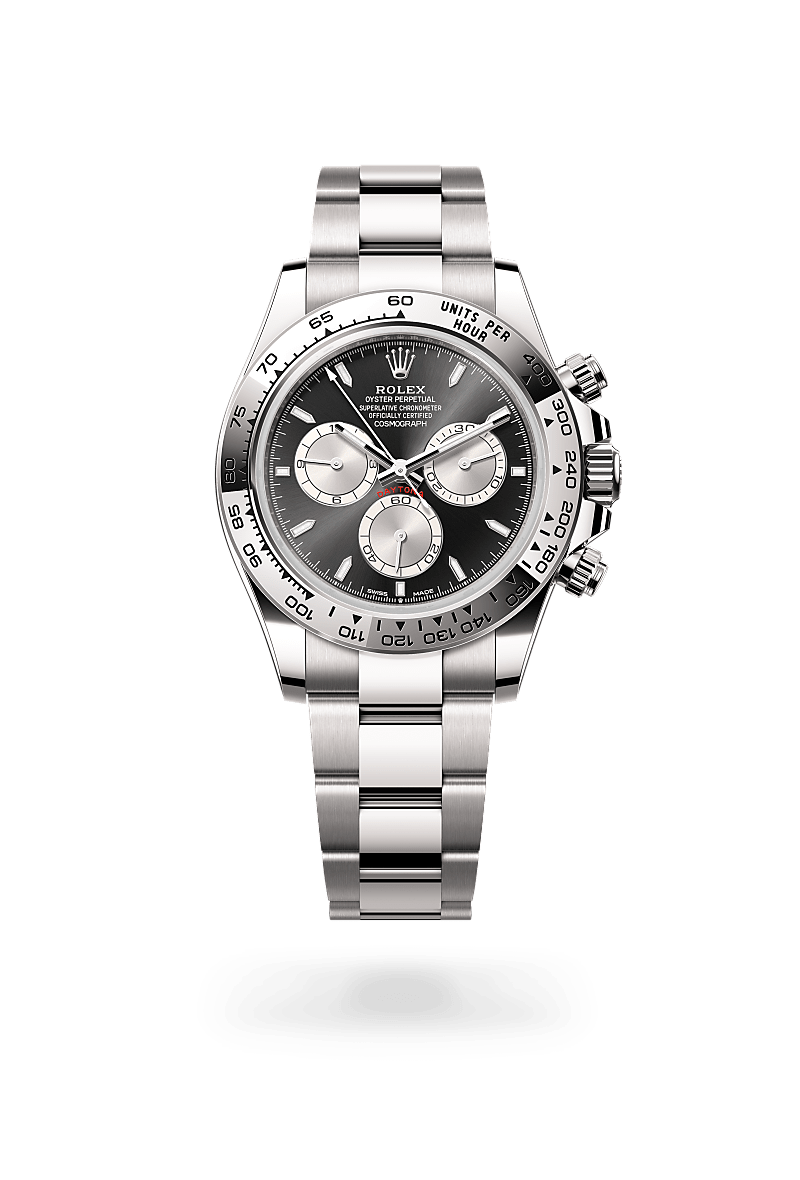 Rolex Cosmograph Daytona in 18 kt white gold with a bright black and steel dial, fixed, with engraved tachymetric scale, in 18 kt white gold bezel, and Oyster bracelet.