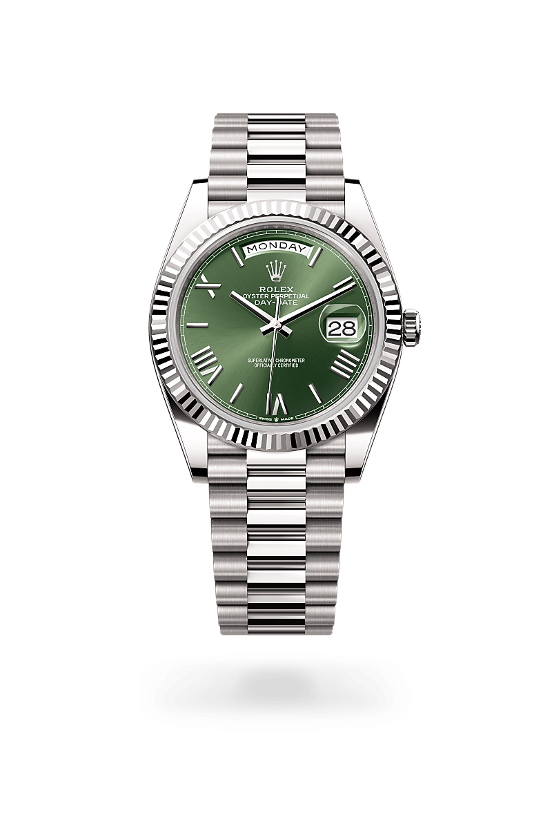 Rolex Day-Date 40 in 18 kt white gold with a olive green dial, fluted bezel, and President bracelet.