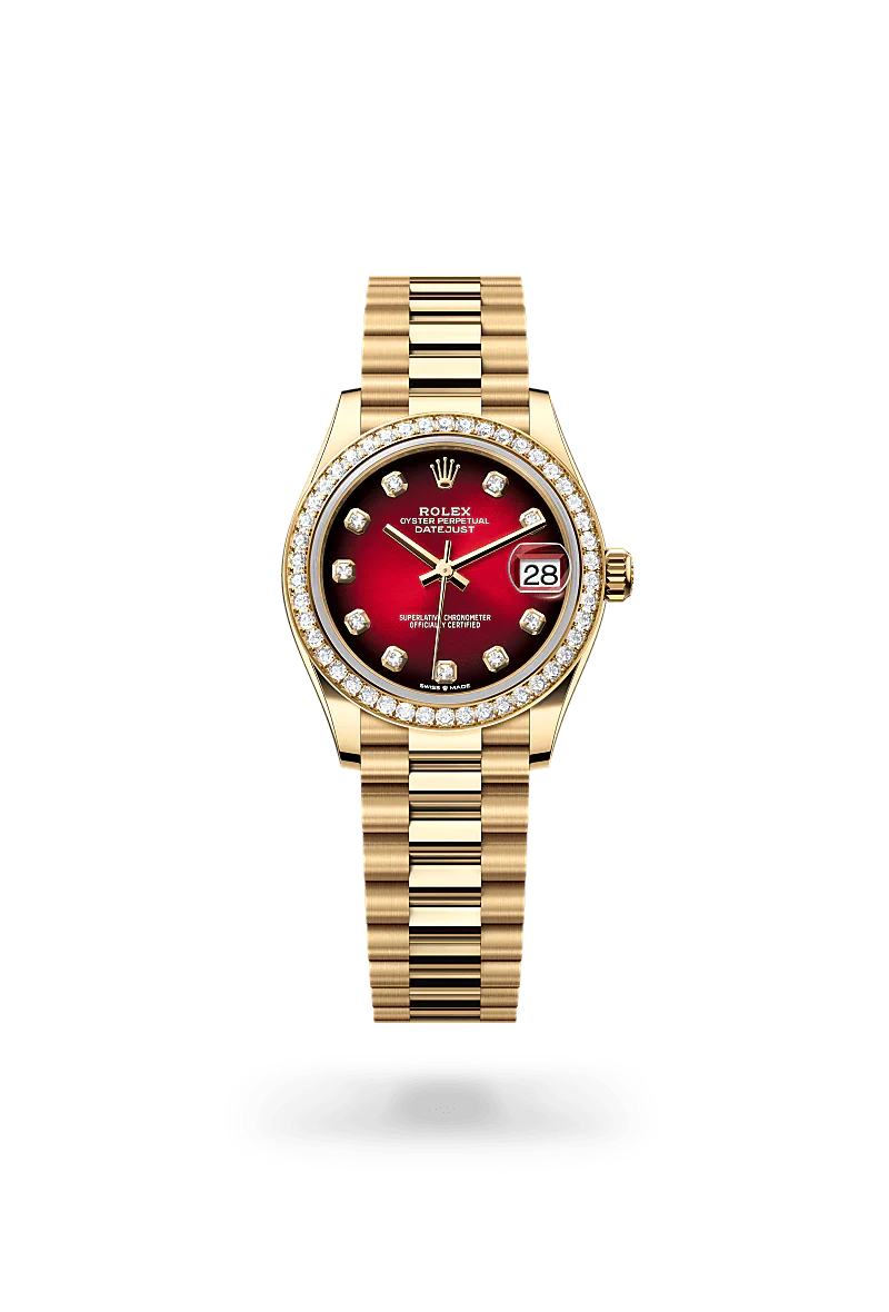 Rolex Datejust 31 in 18 kt yellow gold with a red ombr&eacute; set with diamonds dial, set with diamonds bezel, and President bracelet.