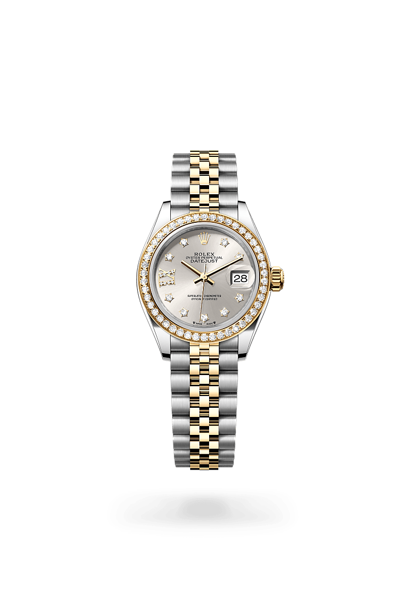 Rolex Lady-Datejust in Yellow Rolesor with a silver set with diamonds dial, set with diamonds bezel, and Jubilee bracelet.