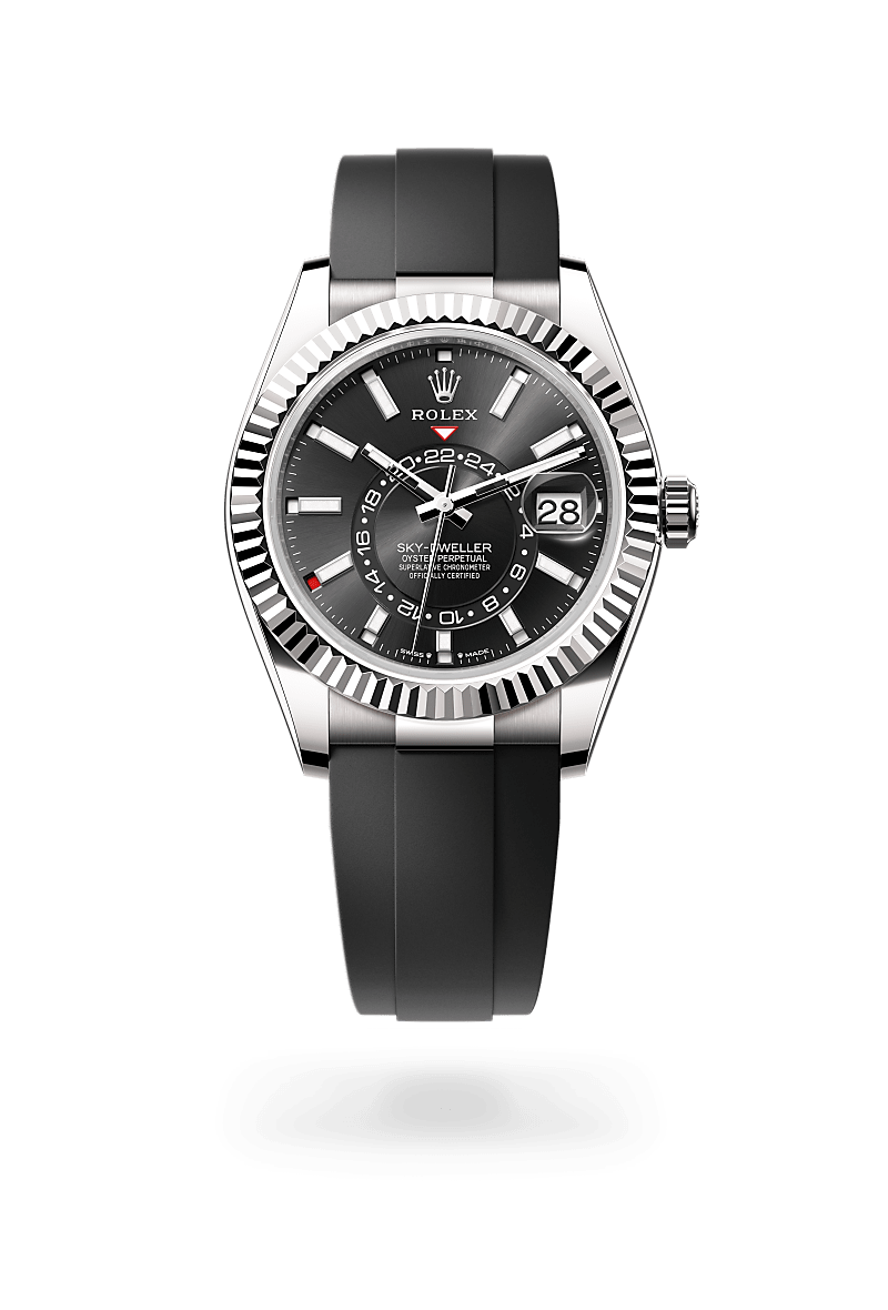 Rolex Sky-Dweller in 18 kt white gold with a bright black dial, fluted, bidirectional rotatable rolex ring command bezel, and Oysterflex bracelet.